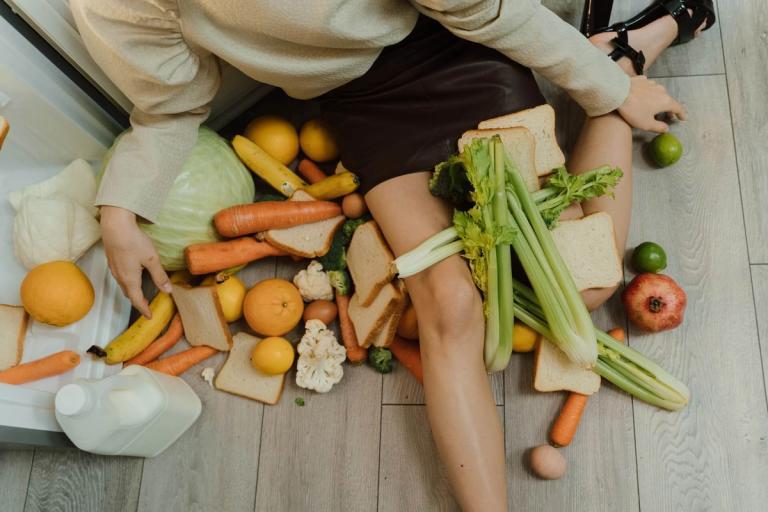 Variety of foods scattered on the floor.