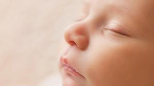 Close-up of a sleeping baby's face.