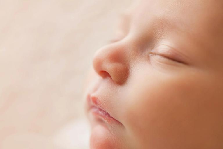 Close-up of a sleeping baby's face.