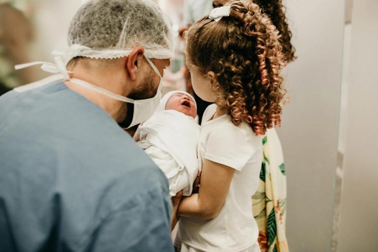 Newborn crying in the hospital.